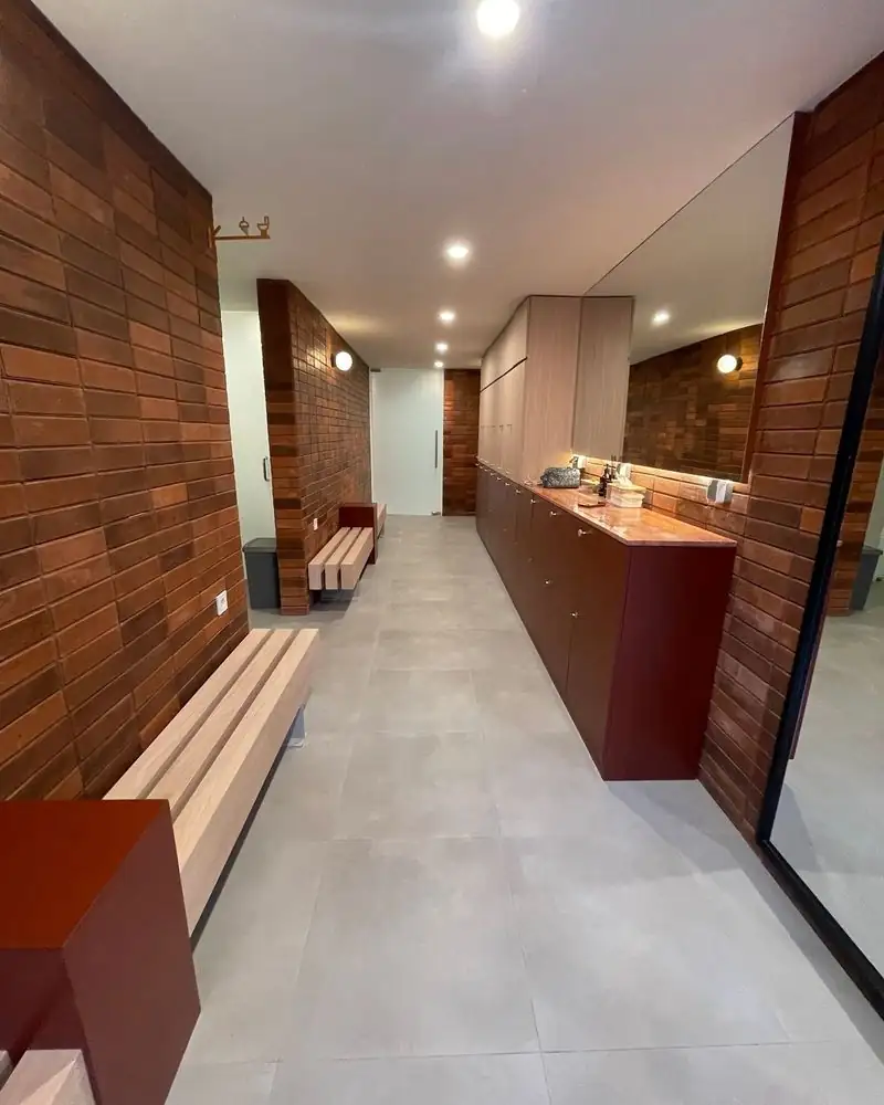 Locker room with wood-plank walls and benches